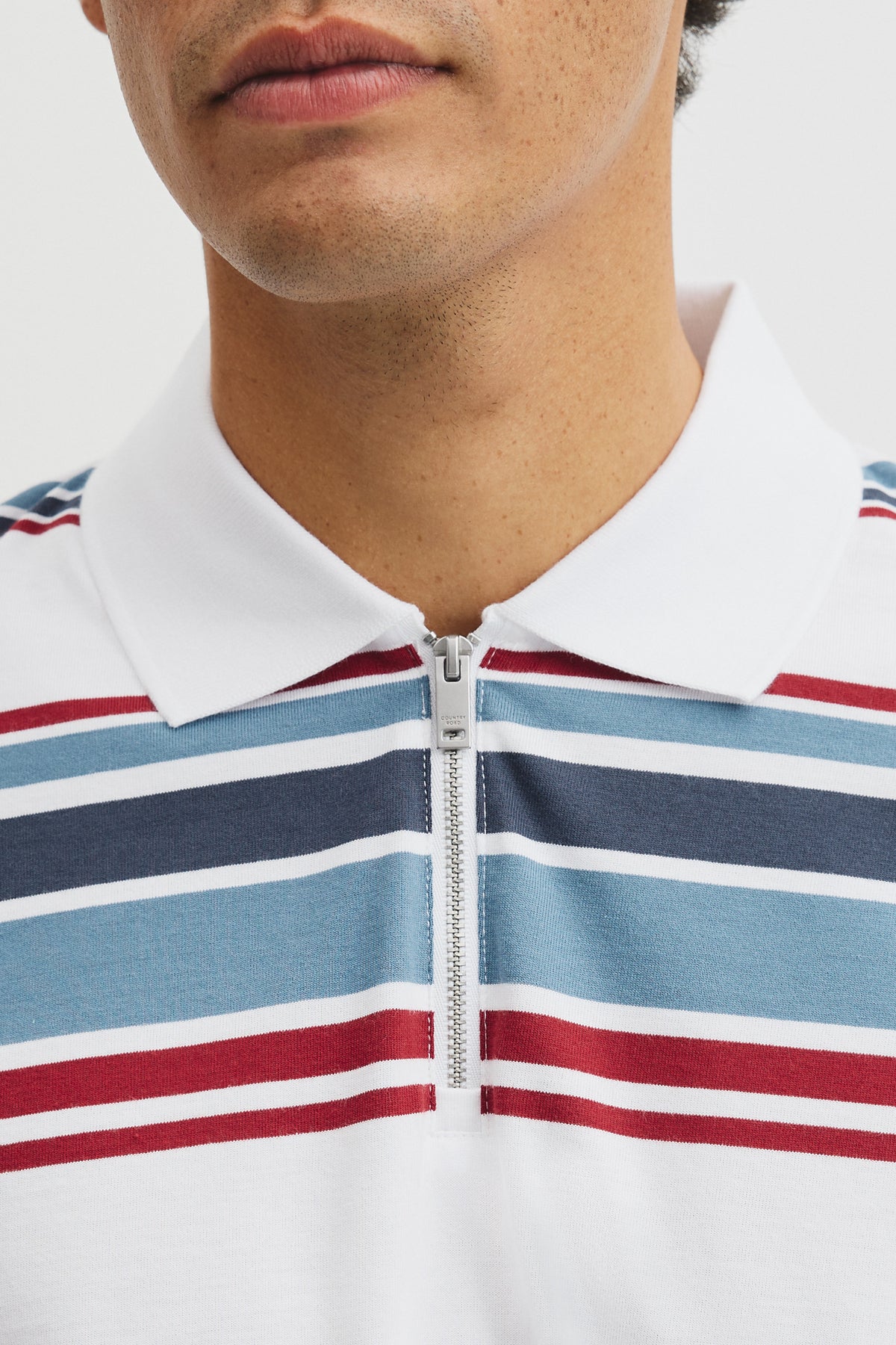 Multi Stripe Zip Polo